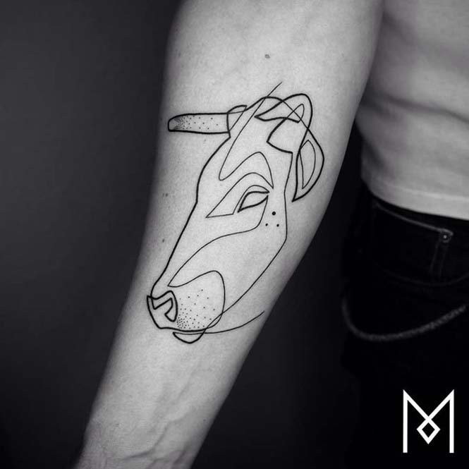 Τατουάζ με μια γραμμή από τον Mo Ganji (10)