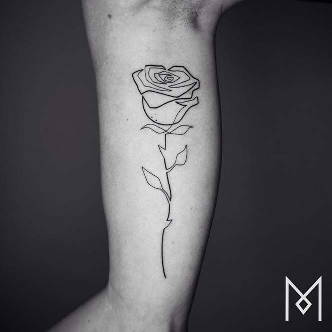 Τατουάζ με μια γραμμή από τον Mo Ganji (14)